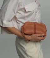 Textured-leather vanity case in peach
